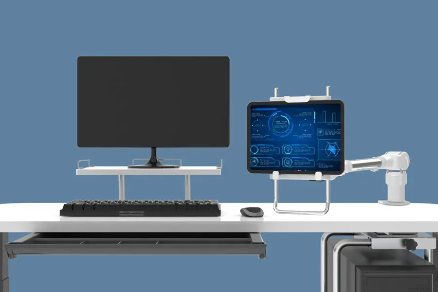 Office desk with a monitor stand and a tablet on an arm